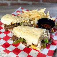 Philly Cheesesteak · Thinly sliced steak served Philly-style with our pepper and onion mix, cheese whiz and red p...