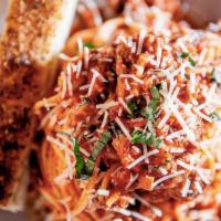 Big City Bolognese Pasta · A hearty bowl of spaghetti, topped with a savory made-from-scratch Bolognese sauce, fresh ba...