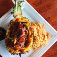 Hawaiian Chicken · Chicken and bell peppers smothered in Hawaiian sauce and served with rice.