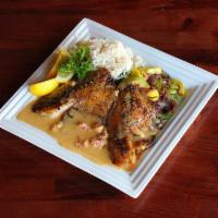 Blackened Tilapia · Tilapia filet served with Cajun crawfish tail sauce, house veggies and rice.