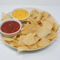 Chips & Queso · In-house queso with salsa and tortilla chips.