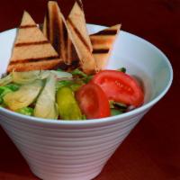 House Greek Vibe Salad · Robust greens with feta vinaigrette, cucumbers, Roma tomatoes, artichoke hearts, black olive...