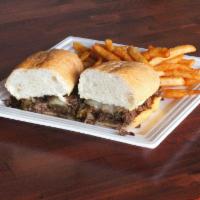 Dr. Philly Cheese Steak · Thin shaved steak, caramelized dr. pepper onions, and bell peppers covered in silky cheese o...