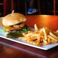 The Classic Cheeseburger · All-beef patty with tomatoes, lettuce, cheese, and an onion ring on our toasted steakhouse b...