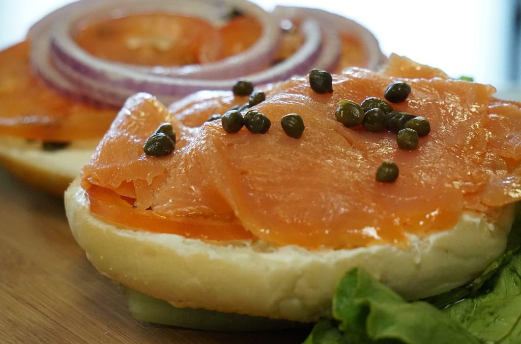 Nova Lox  · Smoked salmon with plain cream cheese, tomato, and red onion on a choice of toasted bagel.
**Capers optional