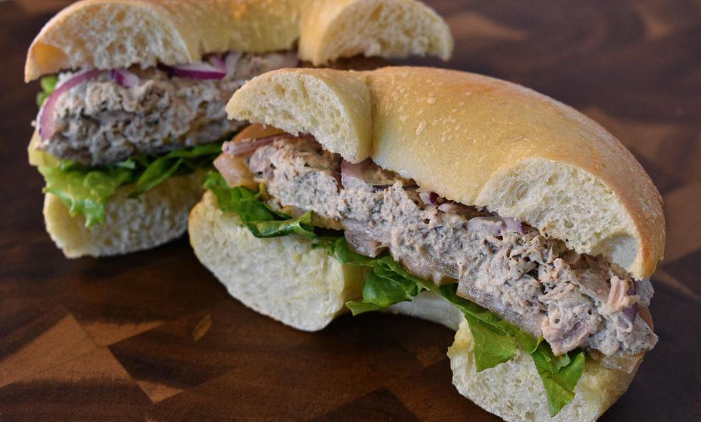 Tuna Salad Sandwich · Fresh tuna salad, lettuce, tomato, and onion on choice of toasted bagel.