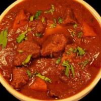 57· Vindaloo · Cooked with potato fiery red chilies, spices and a touch of vinegar to create our hottes dis...