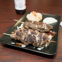 Beef Kabob Platter · Marinated grilled beef in garlic, olive oil, and lemon juice, served with sautéed vegetables...