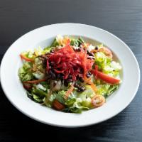 Southwest Fajita Salad · Romaine, sauteed onions & peppers, black beans, tomatoes, Cabo dressing & tortilla chips.