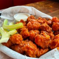 Cauliflower Wings · 1 lb. of our special recipe cauliflower wings, tossed in your choice of sauce and ranch or b...