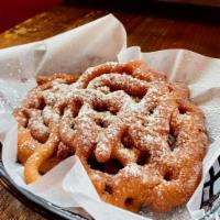 Funnel Cake · Topped with powdered sugar.