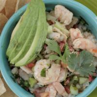 Ceviche · Shrimp, diced tomatoes, onions, cilantro, lime juice, cucumbers and jalapenos.  Served with ...