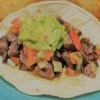 Carne Asada Taco · Citrus marinated skirt steak mixed with Pico de Gallo and topped with our homemade guacamole.