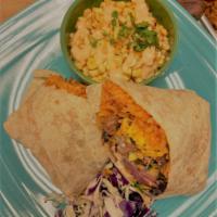 Fajita Burrito-Steak · Sauteed Vegetables, Black Beans, Cheddar Cheese, Mexican Rice, Served with Mexican Corn.