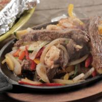 Fajitas - Grilled Steak · Our signature fajitas sauteed with bell peppers, onions, yellow squash and Italian zucchini....