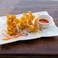 9. Cream Cheese Wontons · Deep fried cream cheese wrapped in wontons and served with sweet chili sauce.