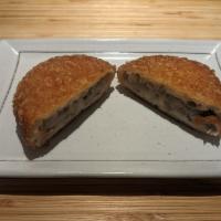 Beef Korokke · Deep fried croquette with ground sirloin, potato and onion in thin crispy panko shell