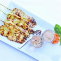 Chicken Satay · Marinated grilled chicken on a skewer. Served with peanut and cucumber sauces.