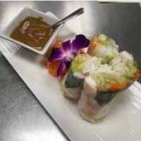 Fresh Shrimp Spring Roll · 4 pieces. Shrimp with fresh roll stuffed with carrot, lettuce and fresh basil. Serve with pe...