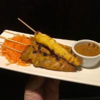 Chicken Satay · 4 pieces. Sliced, marinated, skewered and grilled meat-on-stick served with Thai peanut sauce.