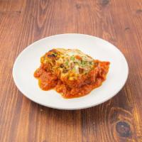 Lasagna di Carne · Traditional Emilian lasagna with meat ragout and cheese.