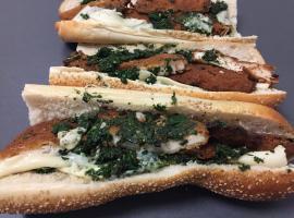 Italian Chicken Cutlet Sandwich · Seeded or unseeded roll. Breaded Italian chicken cutlets, with sharp provolone and sauteed s...