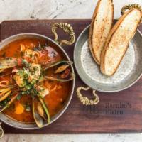 Seafood Cioppino · Salmon, shrimp, mussels, bay scallops, calamari, tomato, lobster broth and crostini. Gluten ...