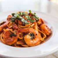 Linguini Shrimp Diavola · Garlic shrimp, chiles, roasted plum tomatoes, lobster broth, cream and sherry.
