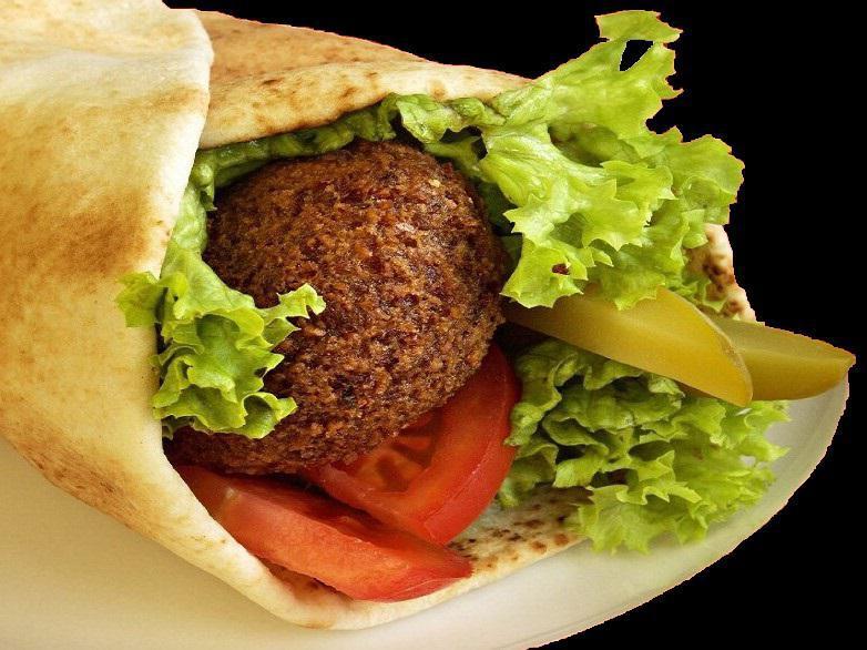 Falafel Wrap · Three Falafel pieces topped with Hummus, Lettuce, Tomatoes, Pickles and Tahini sauce and wrapped in a Fresh Pita.