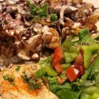 Zahra (Cauliflower) Entree · Seasoned fried Cauliflower and Onions served on a bed of House Rice and drizzled with Tahini...