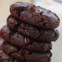 Vegan Fudge Brownie Chocolate Chip Cookie Box · These decadent chocolate cookies pack a triple punch stuffed with rich fudge chunks and gooe...