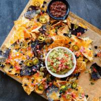 Loaded AF Nachos · Choice of santa fe chicken or beef, house-made tortilla chips, brewery queso, chipotle cream...