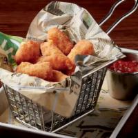 Cheese Curds · Crispy cheese curds served with tomato jam.  740 calories.