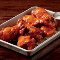 Wings · Choice of traditional or boneless. Choice of BBQ, Buffalo, or sweet chili glazed wings. Serv...