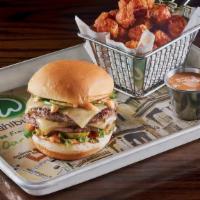 Fiesta Burger · Two 1/4 lb. burger patties dusted with housemade Southwestern spice rub, fresh jalapenos, le...