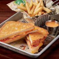 Grown-Up Grilled Cheese · Swiss cheese, white cheddar cheese, government cheese, tomato, and bacon jam served between ...