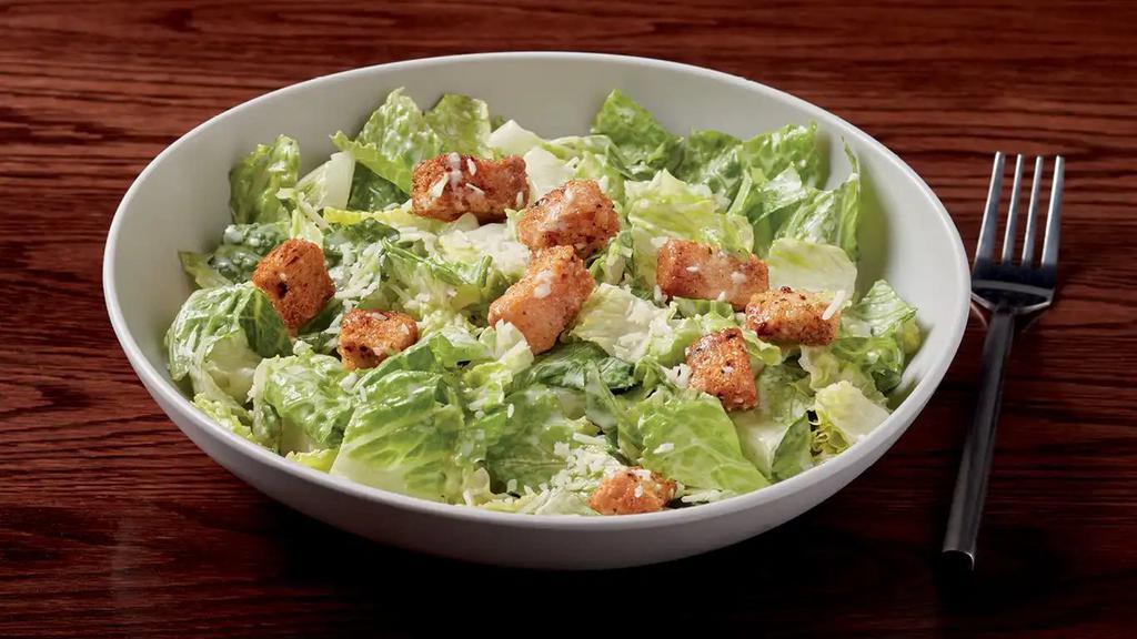 Caesar Salad · fresh romaine, housemade croutons, and Parmesan cheese served with housemade Caesar dressing.  560 calories.