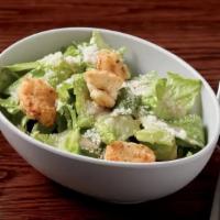 Caesar Side Salad · Fresh romaine, housemade croutons, and Parmesan cheese served with Caesar dressing (dressing...