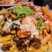 Surf and Turf Fries · French fries topped with mozzarella cheese, sautéed onions, mild Anaheim pepper, carne asada...