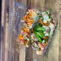 Ceviche Sampler · Ceviche Sampler of our most popular ceviche tostadas! Tsunami, Wipeout, and Fish Ceviche. Se...