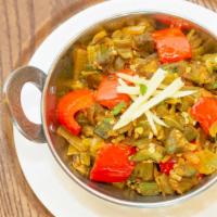 Bhindi Masala · Okra sauteed with onions, tomatoes and oriental spices.