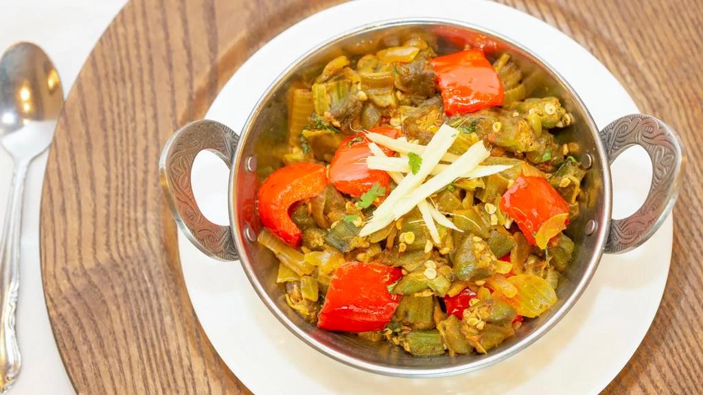 Bhindi Masala · Okra sauteed with onions, tomatoes and oriental spices.