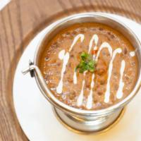 Daal Makhani · Black beans and lentils simmered in cream for hours, lightly fried in butter with fresh onio...