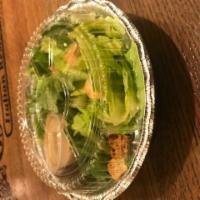 Caesar Salad · Romaine lettuce, croutons, parmigiana cheese.