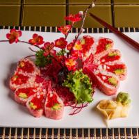 Pink Lady Roll  · (10 pcs) Spicy tuna, avocado, Shrimp ,red tobiko,topped with tuna sashimi, with soy bean pap...