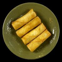 Vegetable Spring Rolls · 4  crispy rolls filled with Cabbage, Green Beans, Carrots, Mushrooms, Onions, Vermicelli, Sp...