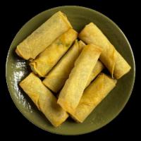 Family Size Spring Rolls · 8  crispy rolls filled with Cabbage, Green Beans, Carrots, Mushrooms, Onions, Vermicelli, Sp...