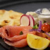 Ivy City Smokehouse Fish Board · Locally smoked salmon, whitefish salad, capers, red onion, cucumber, plum tomato, 
horseradi...