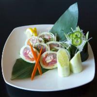 Sashimi Special Roll · Tuna, salmon, albacore, crab, avocado, wrapped in cucumber with ponzu.