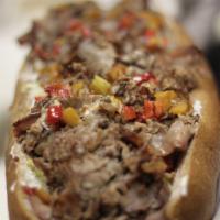 Sweet Baby Rays BBQ Steak Sub · We only hand trim the finest cuts of choice, Certified Angus Beef that we slice Fresh in hou...
